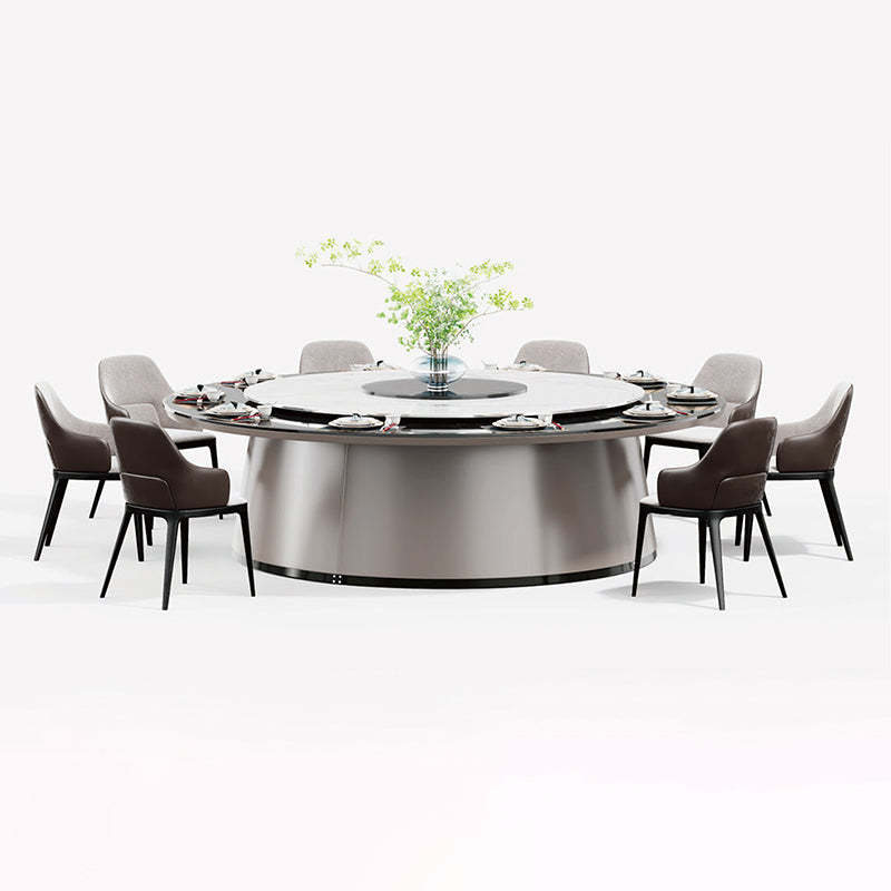 酒店包廂電動餐枱,宴會廳大圓枱,家居電動轉盤餐枱,豪華圓形設計配旋轉轉盤,周圍環繞優雅座椅,置於精緻室內空間,適合高端宴會用餐。Luxury hotel private room electric dining table with rotating turntable, surrounded by elegant chairs in a sophisticated interior, ideal for upscale banquets.electric rotating dining table Hong Kong,luxury sintered stone dining table,