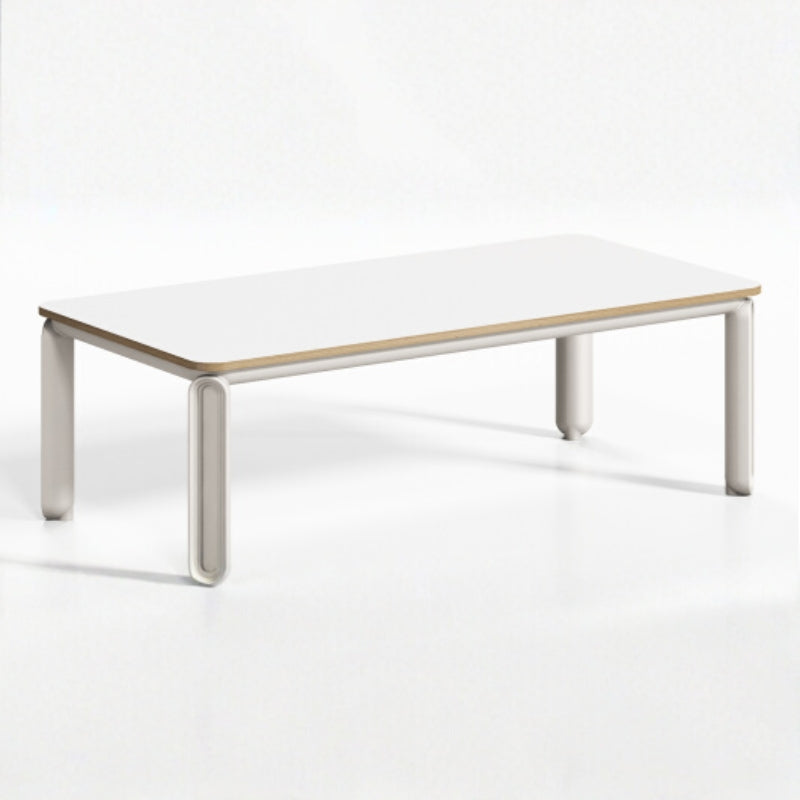 簡約會議空間展示白框木面會議桌配藍色座墊人體工學椅、筆電及裝飾植栽,城市景觀窗增添開闊感Minimalist conference space featuring white-frame wood-top table with blue-seat ergonomic chairs, laptop and decorative plants, city view windows