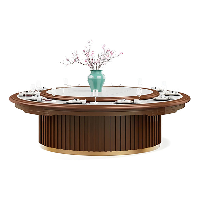 酒店包廂電動餐枱,宴會廳大圓枱,家居電動轉盤餐枱,豪華圓形設計配旋轉轉盤,周圍環繞優雅座椅,置於精緻室內空間,適合高端宴會用餐。Luxury hotel private room electric dining table with rotating turntable, surrounded by elegant chairs in a sophisticated interior, ideal for upscale banquets.electric rotating dining table Hong Kong,luxury sintered stone dining table,