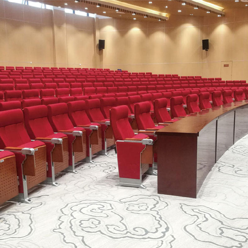 高級禮堂椅，紅布套升降靠背設計，配合鋁合金椅架，廣泛應用於演講廳、會議室、劇院等場景，提供舒適的觀看體驗。Premium auditorium seating chair with red upholstered backrest, aluminum frame structure. Ideal for theaters, conference halls, and lecture venues. Ergonomic design for optimal viewing comfort.