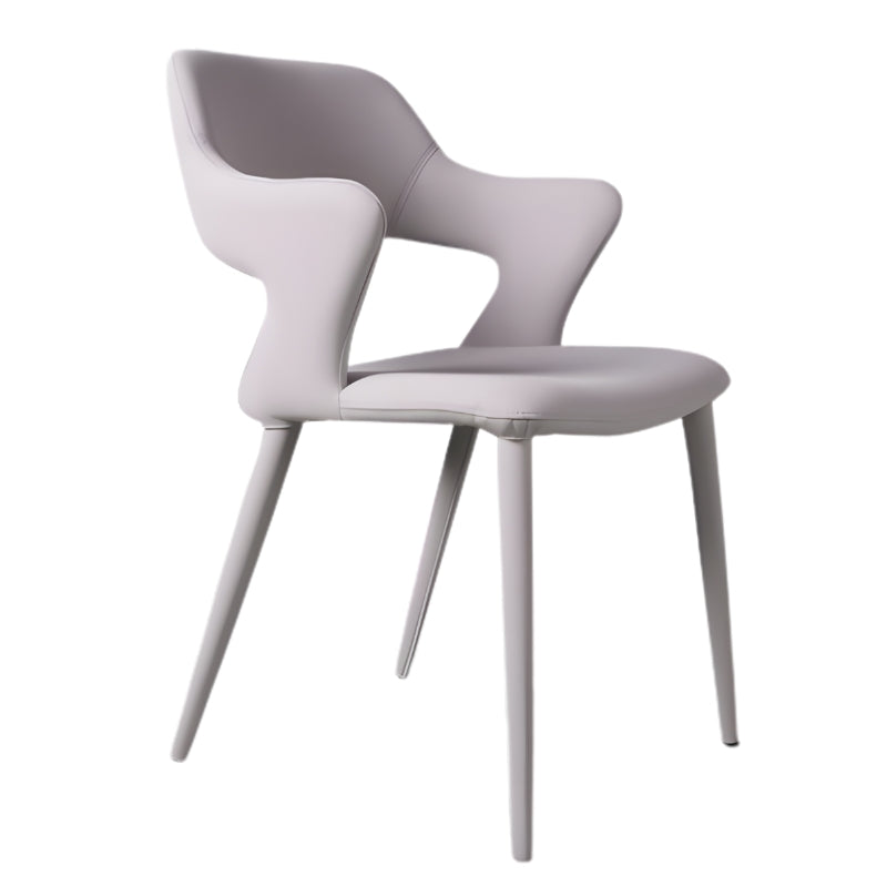 高級簡約餐椅，一體成型椅背設計，簡潔優雅的輪廓線條，適合現代居家和商業空間餐廳佈置 This high-end minimalist dining chair features an integrated backrest design with simple and elegant contour lines, making it suitable for modern home and commercial space restaurant settings.