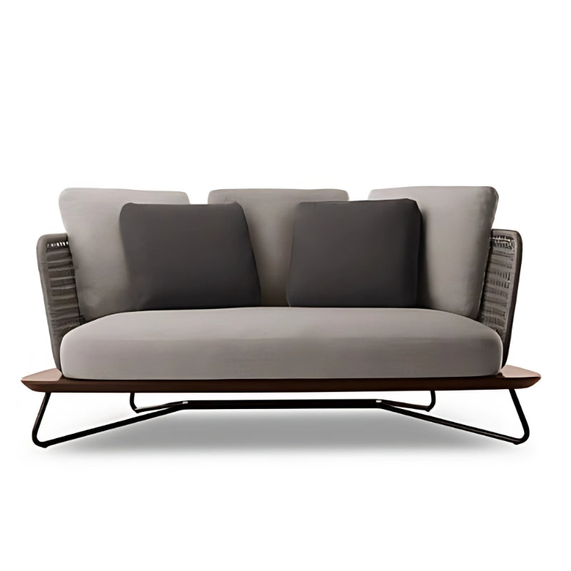 時尚編織戶外沙發套裝，配備三座位沙發及兩張單人扶手椅，置於陽光明媚天台，背景是香港城市和山景。露台休閑家具組合搭配米色坐墊，適合戶外聚會。Stylish woven outdoor sofa set with three-seater sofa and armchairs on a sunny Hong Kong rooftop terrace with city and mountain views. Patio furniture set features beige cushions, perfect for outdoor gatherings.