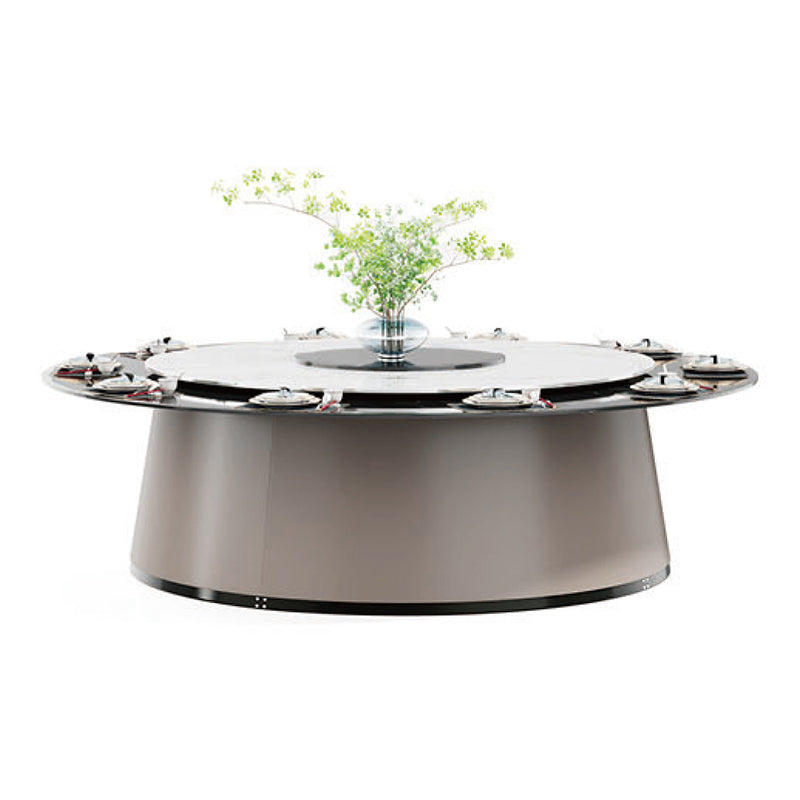 酒店包廂電動餐枱，宴會廳大圓枱，家居電動轉盤餐枱，豪華圓形設計配旋轉轉盤，周圍環繞優雅座椅，置於精緻室內空間，適合高端宴會用餐。Luxury hotel private room electric dining table with rotating turntable, surrounded by elegant chairs in a sophisticated interior, ideal for upscale banquets.electric rotating dining table Hong Kong，luxury sintered stone dining table，